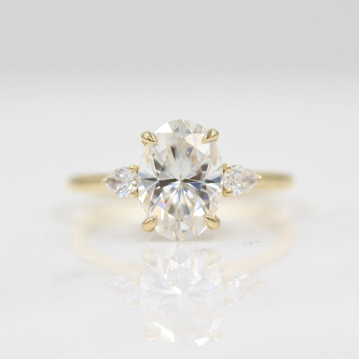 2ct oval moissanite engagement ring with pear accents