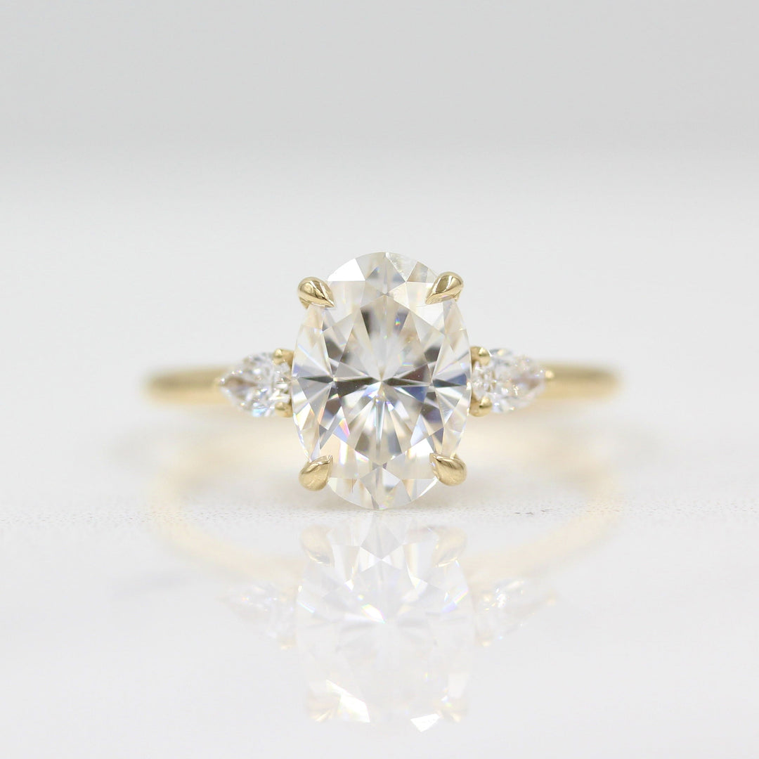 2ct oval moissanite engagement ring with pear accents