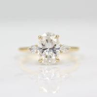 2ct oval moissanite engagement ring with pear accents