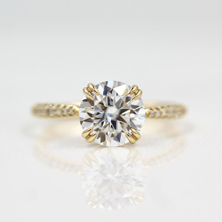 2ct lab grown diamond engagement ring with tapered pavé band and double claw prongs