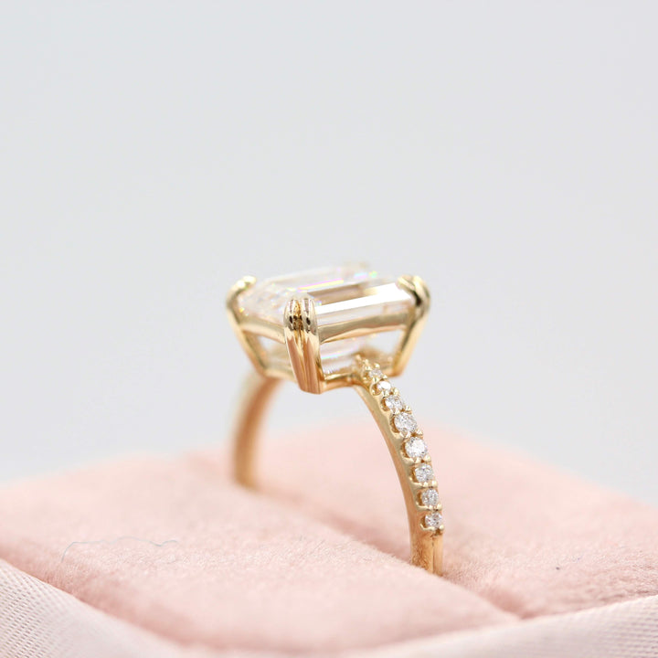 Side shot of the Grace emerald cut engagement ring