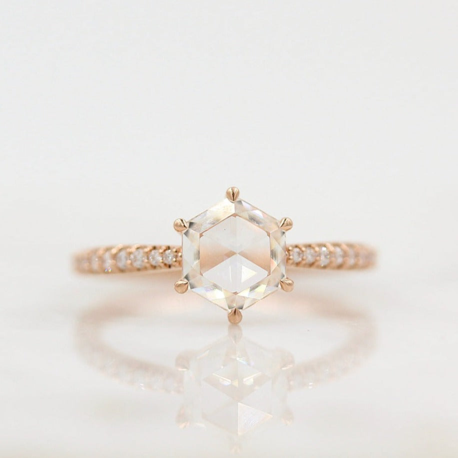 The Aurora Ring (Hexagon) in Rose Gold against a white background