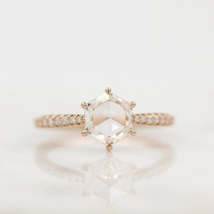 The Aurora Ring (Hexagon) in Rose Gold and Moissanite against a white background