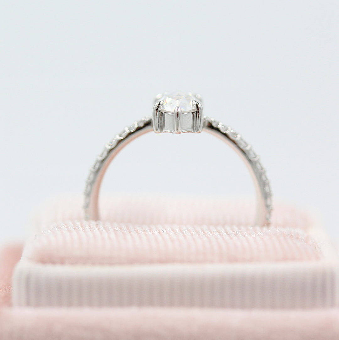The Aurora Ring (Marquise) in white gold in a pink velvet ring box