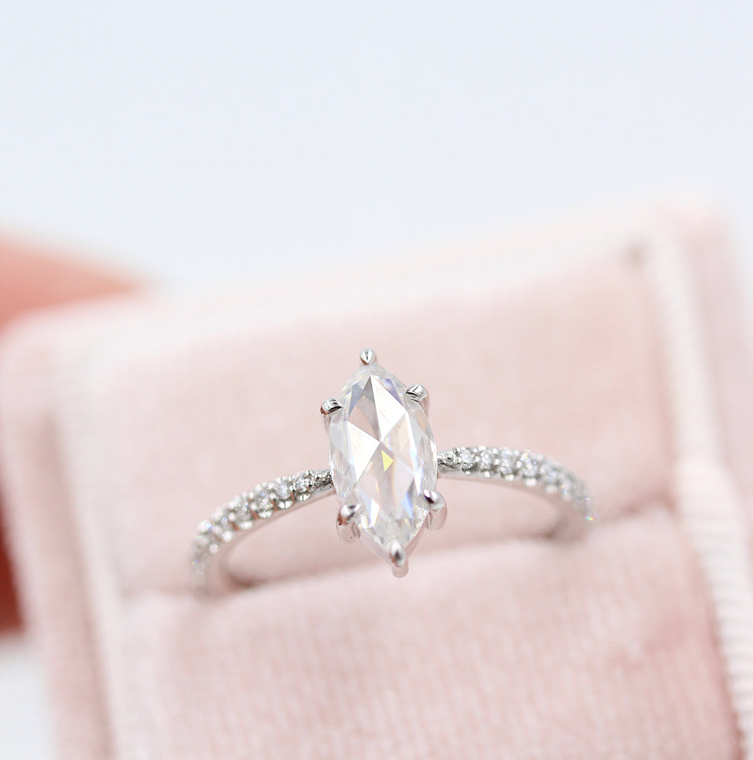 The Aurora Ring (Marquise) in white gold in a pink velvet ring box