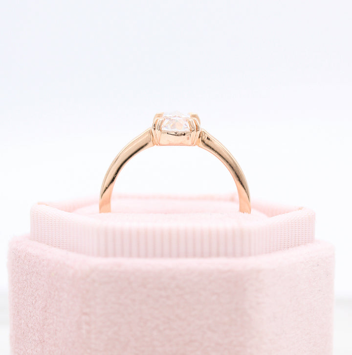The Nora Ring (Oval) in rose gold in a pink velvet ring box