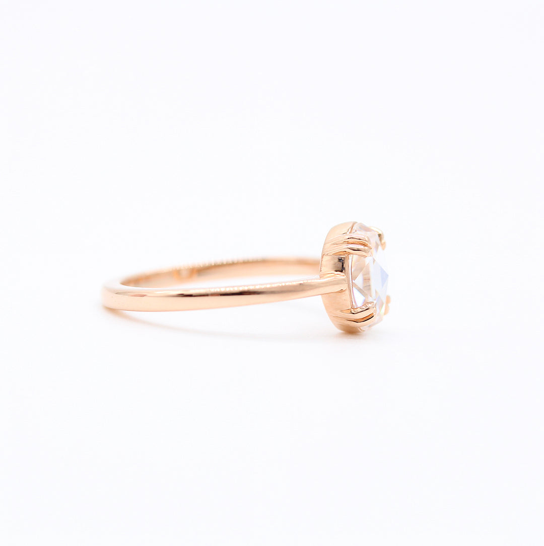 The Nora Ring (Oval) in rose gold against a white background