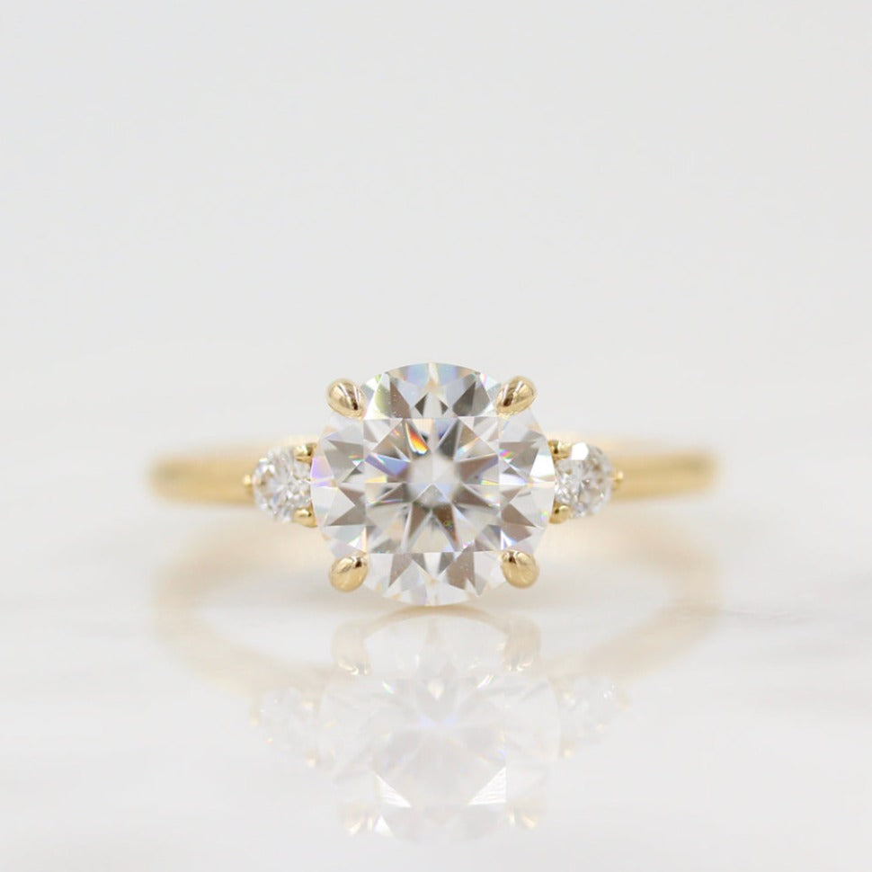 Yellow gold three-stone engagement ring