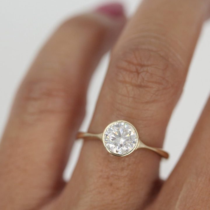 Stevie 1ct round bezel engagement ring in 14k yellow gold
