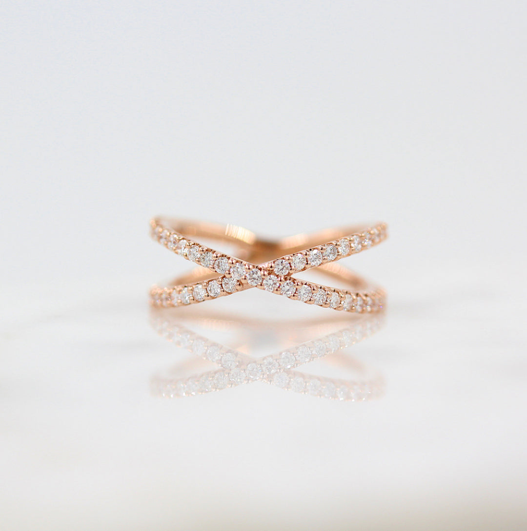 A criss-cross lab-grown diamond ring in 14k rose gold