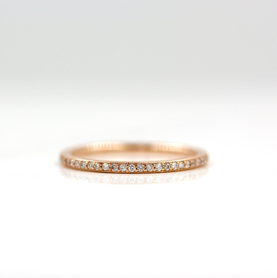 Dainty lab-grown diamond wedding band with milgrain in rose gold