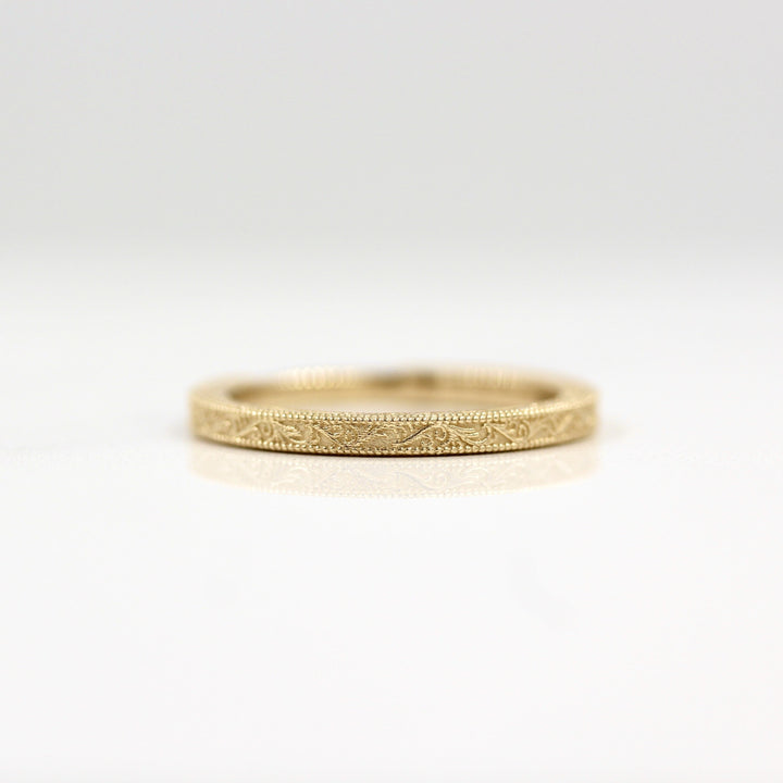 Engraved wedding band with milgrain details