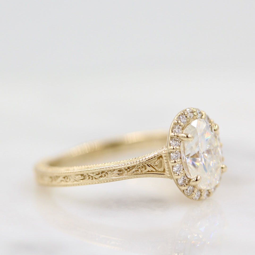 Oval halo engagement ring with engravings