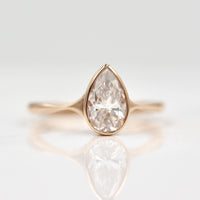 Rose gold moissanite engagement ring 