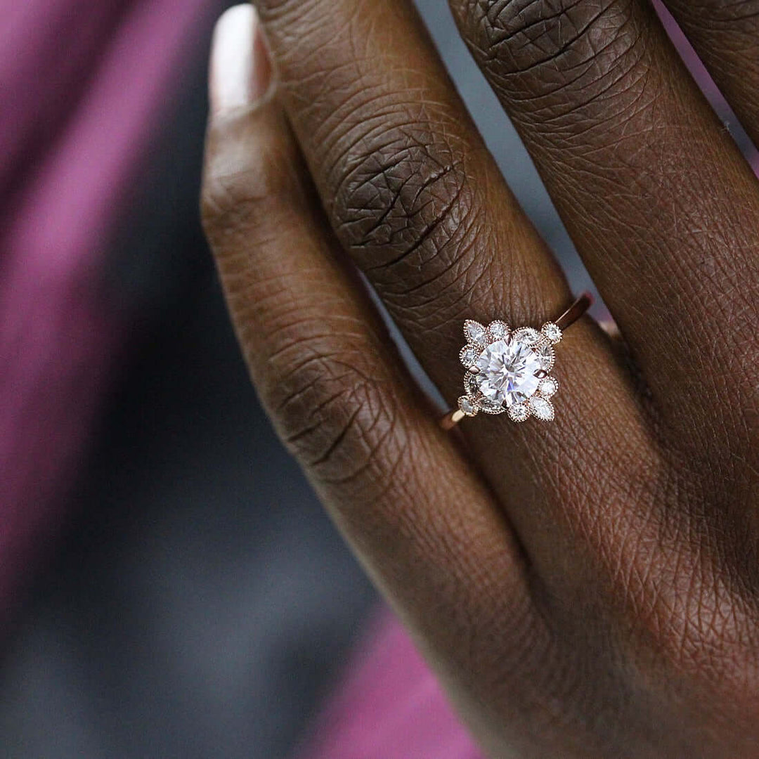 The Harlow Ring (Round) in rose gold modeled on a hand