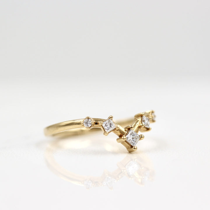 Delicate lab-grown diamond wedding band in 14k yellow gold and lab-grown diamonds