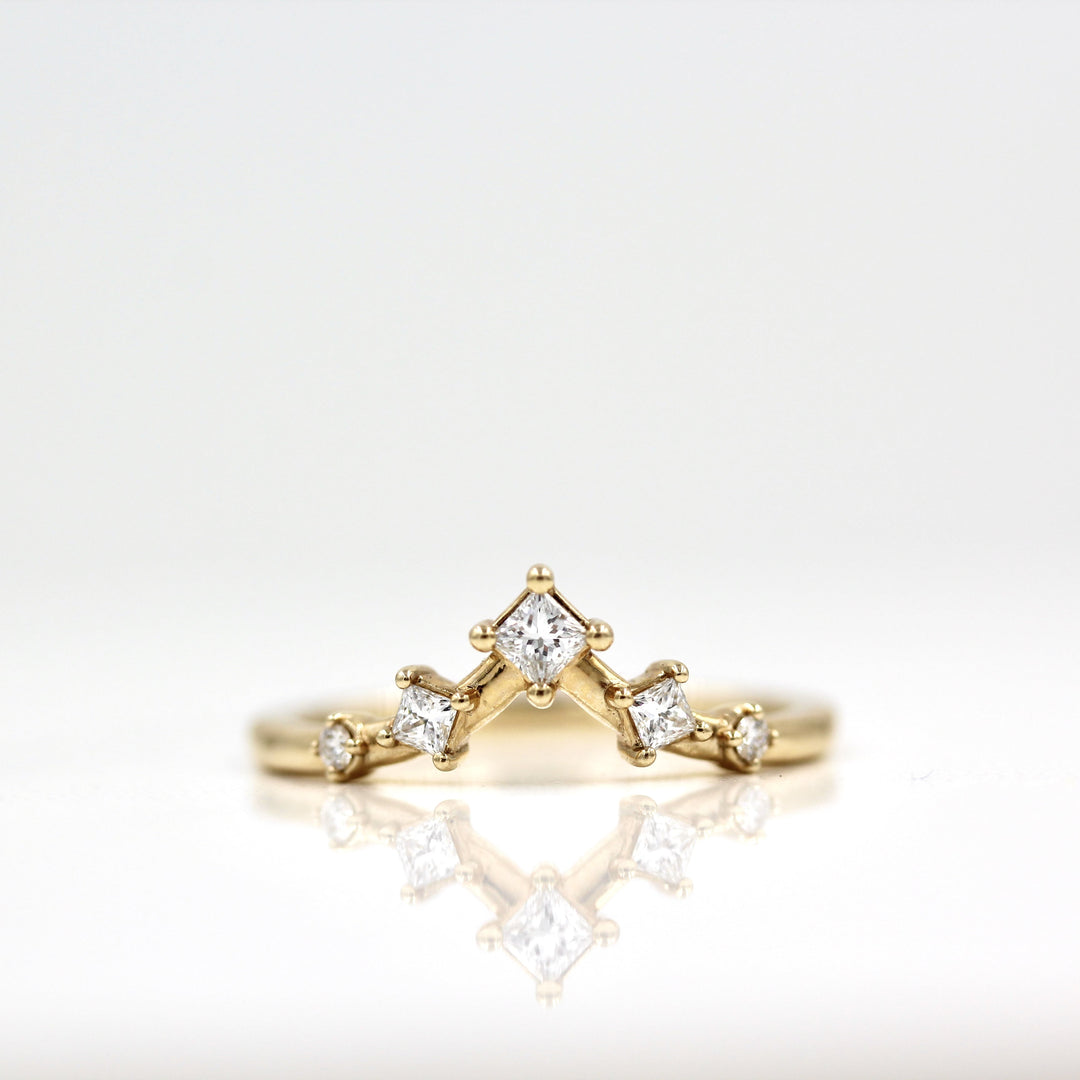 V-shaped lab-grown diamond wedding band in yellow gold