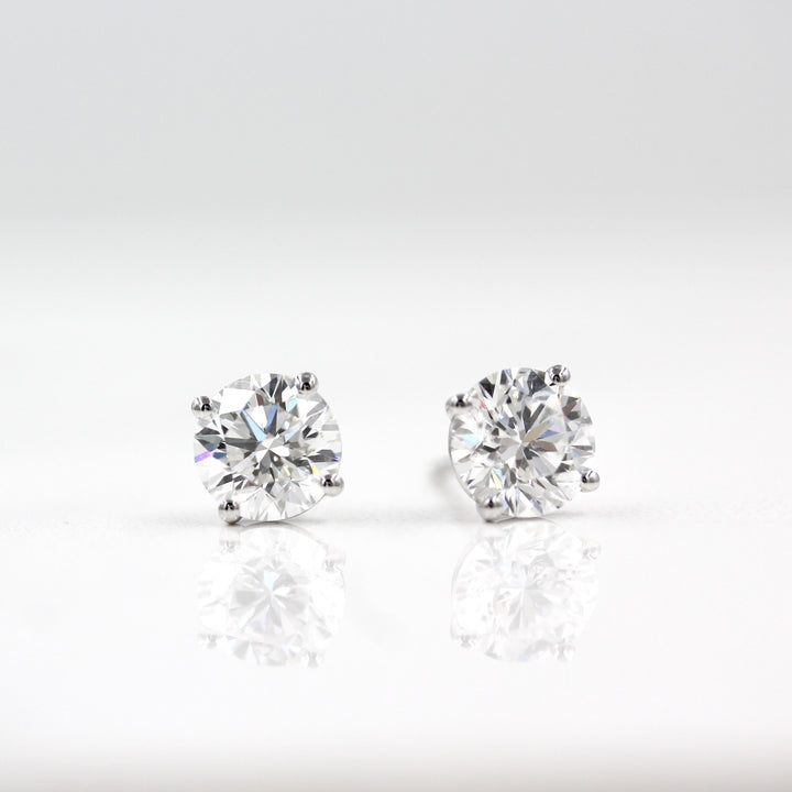 round brilliant diamond earrings in white gold with white background