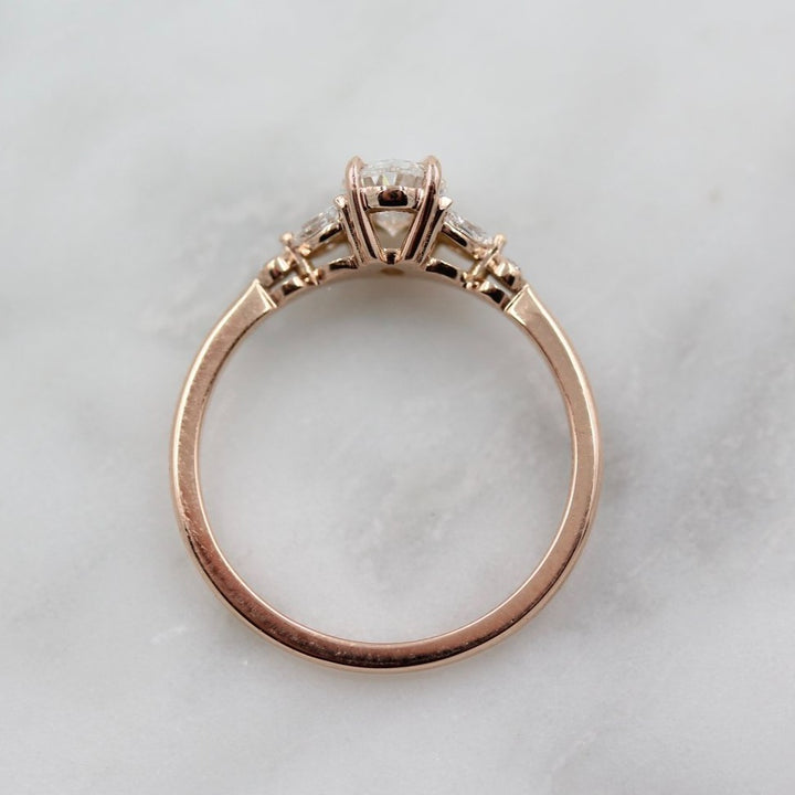 The Sophia Ring - Lab Grown Diamond in rose gold in a profile view against a white background